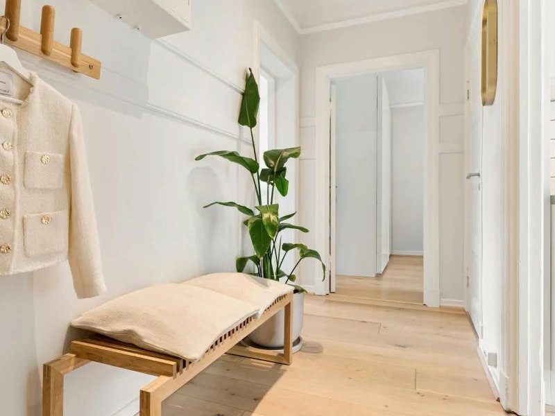 Hallway in a modern home with hardwood flooring
