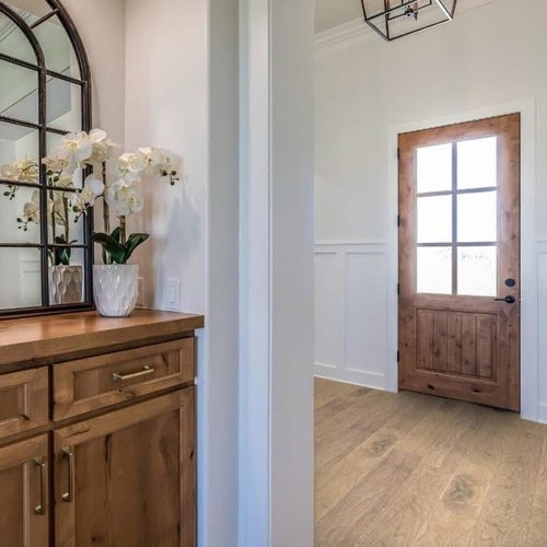 Classic entryway with wood flooring in an Alberta home